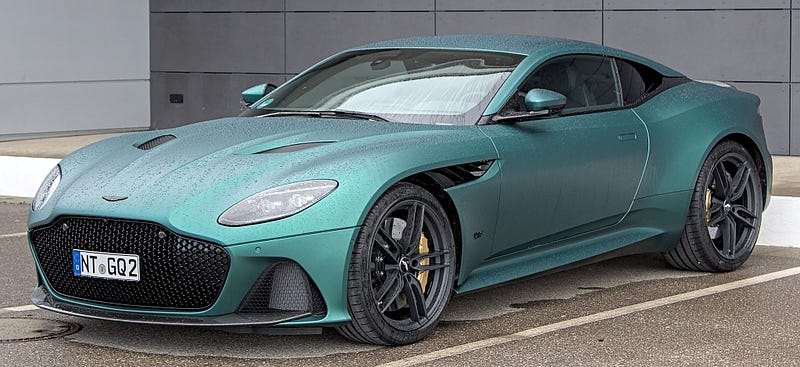 Turquoise Aston Martin sports car on display