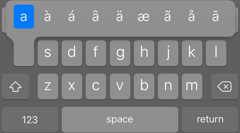 How to access accent symbols on iPhone