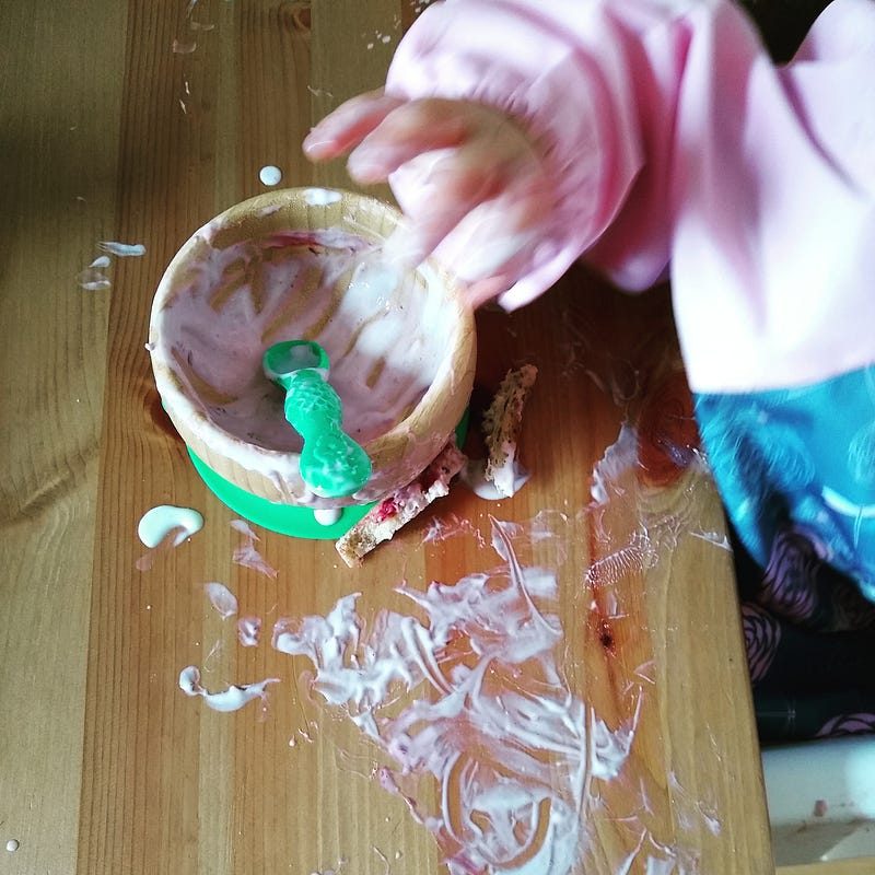 A toddler exploring his surroundings with curiosity.