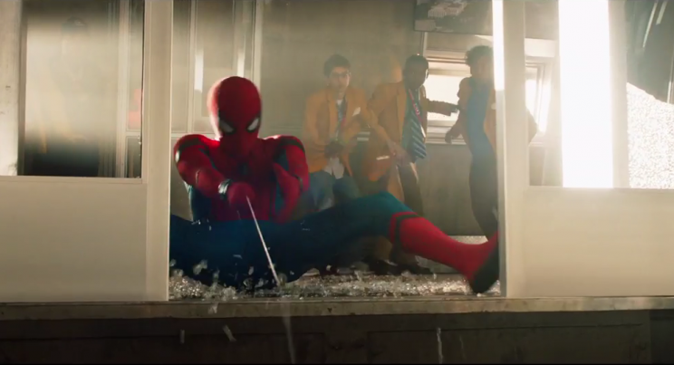 Spiderman saving an elevator in a movie scene